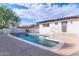 Clean in-ground pool surrounded by patio at 6802 N 22Nd Pl, Phoenix, AZ 85016