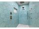 Luxurious walk-in shower with geometric tiles and rainfall shower head at 6802 N 22Nd Pl, Phoenix, AZ 85016