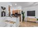 The bar-height countertop area provides seating near the kitchen at 6900 E Princess Dr # 1228, Phoenix, AZ 85054