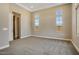 Spacious bedroom with neutral carpet, recessed lighting and ample natural light from large windows at 7210 E Camino Rayo De Luz --, Scottsdale, AZ 85266