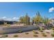 Scottsdale Heights community entrance with desert landscaping and clear blue sky at 7210 E Camino Rayo De Luz --, Scottsdale, AZ 85266