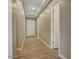 Hallway featuring neutral paint, wood-look flooring, and a clean, modern design at 7210 E Camino Rayo De Luz --, Scottsdale, AZ 85266