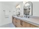 Bathroom features double sinks, modern fixtures, and decorative mirrors at 8336 N 72Nd Pl, Scottsdale, AZ 85258