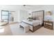 Bright and airy bedroom features a padded headboard, bench, and an ensuite bathroom at 8336 N 72Nd Pl, Scottsdale, AZ 85258