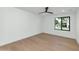 Neutral toned bedroom with ceiling fan and natural light at 8336 N 72Nd Pl, Scottsdale, AZ 85258