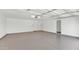 Spacious, clean garage with epoxy flooring and ample room for storage and vehicles at 8336 N 72Nd Pl, Scottsdale, AZ 85258