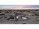 Expansive aerial view of home with pool, garage, and desert landscape at 9120 W Villa Lindo Dr, Peoria, AZ 85383