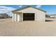 Front view of outbuilding with garage door and an additional service door at 9120 W Villa Lindo Dr, Peoria, AZ 85383