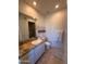 Well-lit bathroom with granite countertops, a sink, a toilet, and a glass-enclosed shower at 10222 E Southwind Ln # 1054, Scottsdale, AZ 85262
