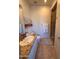 Comfortable bathroom with granite countertops, a sink, a toilet, and a glass-enclosed shower at 10222 E Southwind Ln # 1054, Scottsdale, AZ 85262