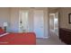Spacious bedroom leads to an ensuite bath and features a neutral color palette at 10222 E Southwind Ln # 1054, Scottsdale, AZ 85262