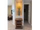 Foyer with decorative niche, display table, and doorway leading to other rooms at 10222 E Southwind Ln # 1054, Scottsdale, AZ 85262