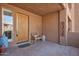 Inviting front porch featuring a wooden bench and decorative accents for a welcoming entrance at 10222 E Southwind Ln # 1054, Scottsdale, AZ 85262