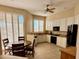 Bright kitchen featuring white cabinets, granite countertops, and stainless steel appliances at 10222 E Southwind Ln # 1054, Scottsdale, AZ 85262