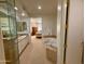 Luxurious main bathroom with double vanity, soaking tub, and seamless glass shower at 10222 E Southwind Ln # 1054, Scottsdale, AZ 85262