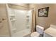 Bright white shower stall with built-in shelves and bronze fixtures at 10811 S 351St Ave, Arlington, AZ 85322