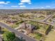 Gorgeous aerial view showcases a meticulously manicured lawn and desert landscaping at 1096 W Via De Palmas --, San Tan Valley, AZ 85140