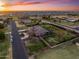 Wide aerial view showcases the property's expansive yard and the surrounding neighborhood at 1096 W Via De Palmas --, San Tan Valley, AZ 85140