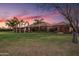 Expansive backyard with lush green grass and a charming pergola at 1096 W Via De Palmas --, San Tan Valley, AZ 85140
