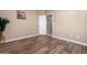 Clean bedroom with a wood floor and walls with light paint and crown molding at 1096 W Via De Palmas --, San Tan Valley, AZ 85140