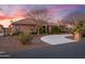 Stunning single-story home with desert landscaping and a circular driveway at 1096 W Via De Palmas --, San Tan Valley, AZ 85140