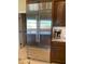 Modern kitchen featuring a stainless steel Sub-Zero refrigerator and custom wood cabinetry at 1096 W Via De Palmas --, San Tan Valley, AZ 85140