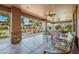 Patio space with stone columns and outdoor seating overlooking the landscaped yard at 1096 W Via De Palmas --, San Tan Valley, AZ 85140
