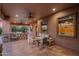 Covered outdoor patio with comfortable seating and ample space at 1096 W Via De Palmas --, San Tan Valley, AZ 85140