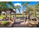 Pergola with privacy curtains and picnic table at 1096 W Via De Palmas --, San Tan Valley, AZ 85140