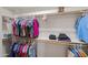 Spacious walk-in closet with organized clothing racks and shelves for ample storage at 1096 W Via De Palmas --, San Tan Valley, AZ 85140