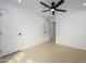 Bright, airy bedroom with neutral floors and white walls, and a modern ceiling fan at 1120 W Barrow Dr, Chandler, AZ 85224