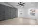 Spacious bedroom with a built-in wardrobe and two windows for ample natural light at 1120 W Barrow Dr, Chandler, AZ 85224
