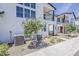 Modern home showcasing a balcony with well-maintained landscaping, and coordinated exterior design at 11300 N Casa Dega Dr # 1006, Surprise, AZ 85388