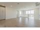 Spacious living room with light hardwood floors and abundant natural light at 11300 N Casa Dega Dr # 1006, Surprise, AZ 85388