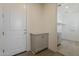 Mudroom features built-in cabinet and access to laundry room at 11300 N Casa Dega Dr # 1006, Surprise, AZ 85388