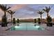 Inviting pool with scenic views of distant mountains, offering a tranquil escape and relaxation at 11300 N Casa Dega Dr # 1006, Surprise, AZ 85388