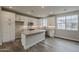 Kitchen with island, stainless appliances, and ample cabinetry at 11300 N Casa Dega Dr # 1020, Surprise, AZ 85388