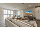 Inviting living room with stylish sofa and view from second floor at 11300 N Casa Dega Dr # 1020, Surprise, AZ 85388