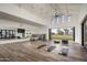 Well-lit yoga studio with hardwood floors and fitness accessories, offering a tranquil and modern space at 11300 N Casa Dega Dr # 1020, Surprise, AZ 85388