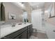 Well-lit bathroom features double sinks, a large mirror, and a shower/tub combination at 12047 E Sereno Rd, Gold Canyon, AZ 85118