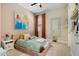 Charming bedroom with pink accents, stylish decor, and soft natural light at 12047 E Sereno Rd, Gold Canyon, AZ 85118