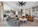 Spacious living room seamlessly connecting to a modern kitchen with ample seating at 12047 E Sereno Rd, Gold Canyon, AZ 85118