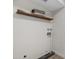 Laundry room with single wood shelf at 1455 N Alma School Rd # 38, Mesa, AZ 85201