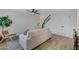 Bright living room with a ceiling fan, staircase, and modern decor at 1455 N Alma School Rd # 38, Mesa, AZ 85201