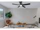 Bright living room with a nearby pool view, modern decor, and an open floor plan at 1455 N Alma School Rd # 38, Mesa, AZ 85201