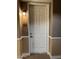 Apartment entrance showing the front door with the unit number, creating a welcoming feel at 14575 W Mountain View Blvd # 11313, Surprise, AZ 85374
