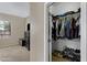 Bedroom with closet offering ample storage space and well-organized shelving at 1473 W Flamingo Dr, Chandler, AZ 85286