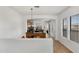 Open-concept living space with ample natural light, seamlessly connecting the dining area and kitchen at 1473 W Flamingo Dr, Chandler, AZ 85286