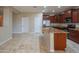 Bright kitchen boasts stainless steel appliances, granite countertops, and ample cabinet space at 15290 W Ventura St, Surprise, AZ 85379