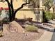Charming condo with manicured landscaping and warm exterior tones on a sunny day at 16724 E Gunsight Dr # 118, Fountain Hills, AZ 85268